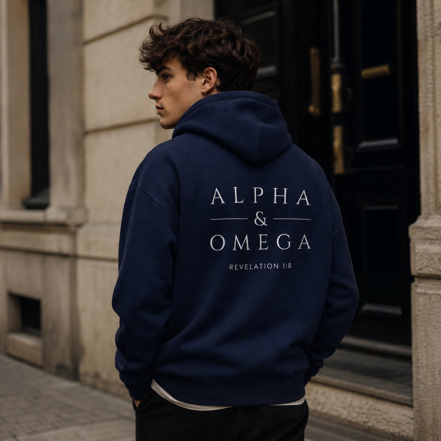 Model wearing The Avielle Alpha & Omega premium zip hoodie inspired by Revelation 1:8.