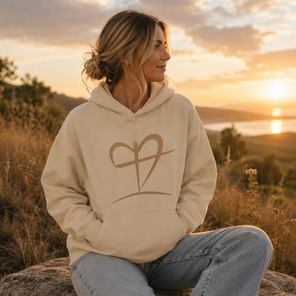 Woman wearing the Heart of Faith sand Christian hoodie by The Avielle