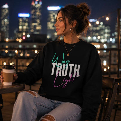 Woman wearing a black Way Truth Light faith-inspired sweatshirt.